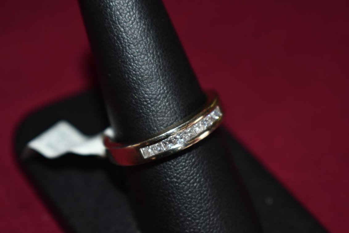 14k 4.00g WG Band, 9 Princess Cut Diamonds