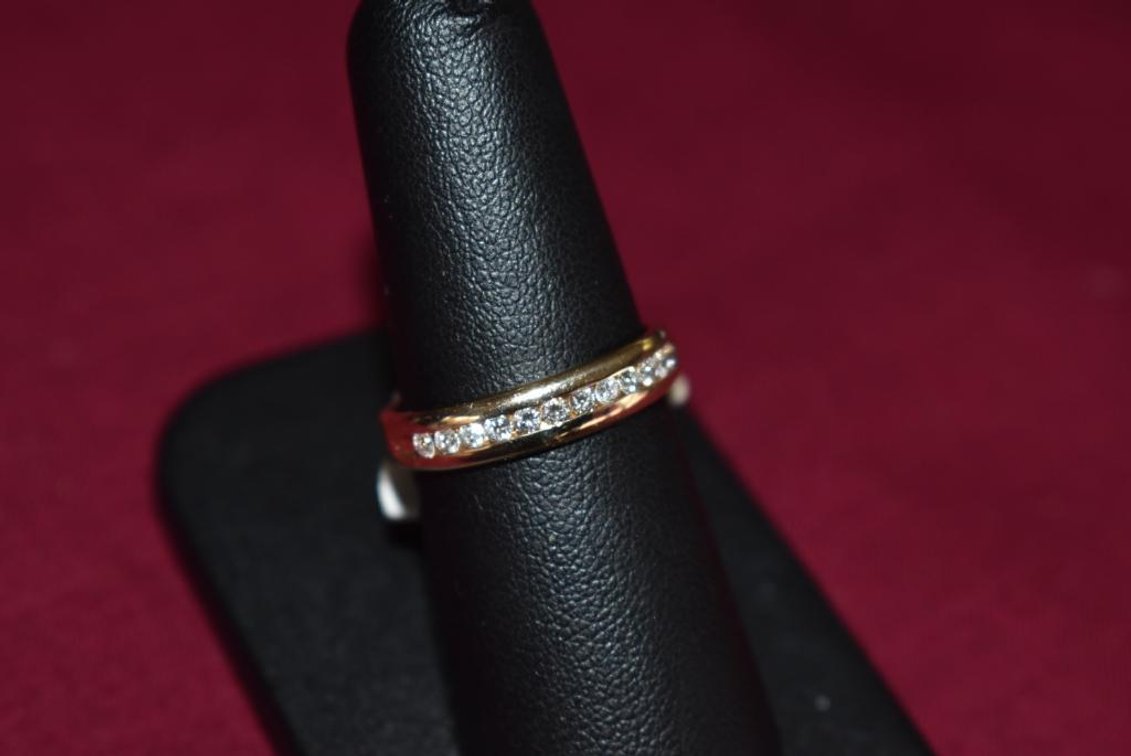 14k 3.20g YG 12 Diamond Band 1/4 Ct.