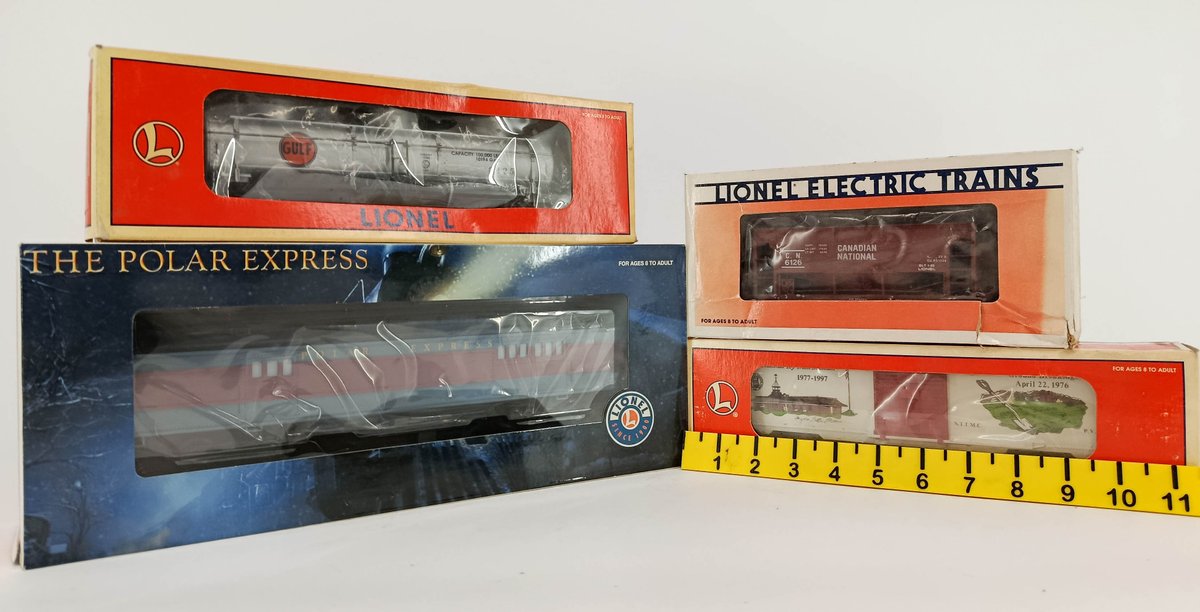O GA. 3 LIONEL FREIGHT CARS AND 1 POLAR EXPRESS BAGGAGE CAR INV 260790732
