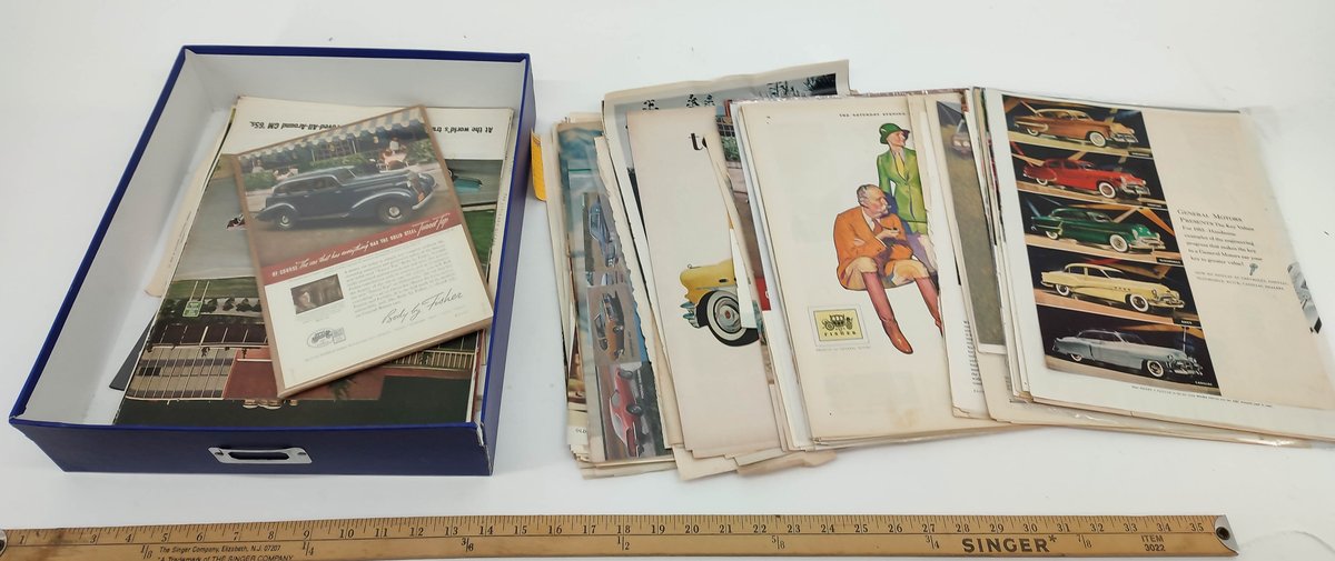 BOX OF TEAR SHEETS. MIXED DATES & MAKES. INV 261570640