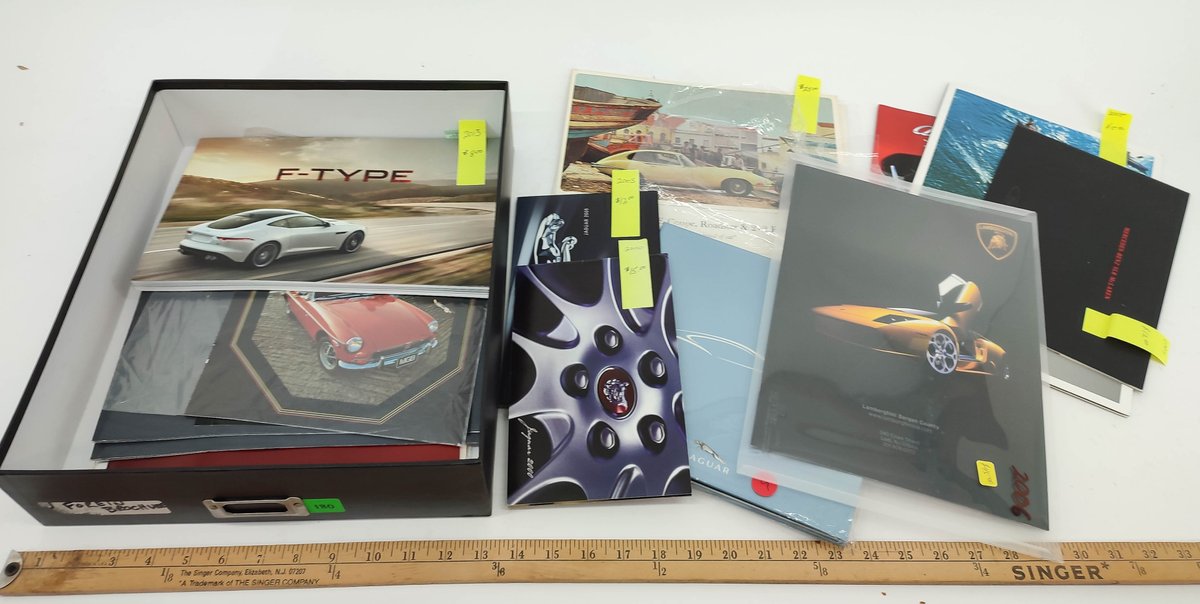 COLLECTION OF MODERN FOREIGN AUTO BROCHURES. INV 261570656