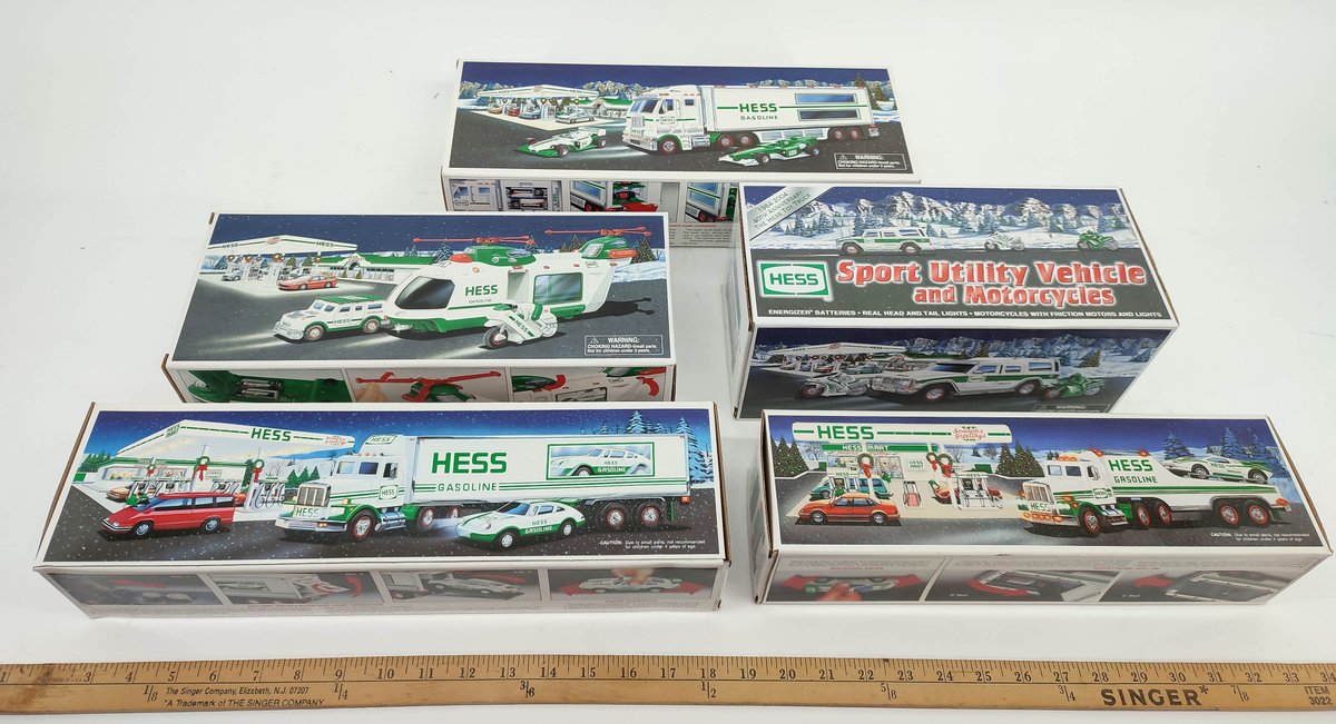 5 HESS TOYS. 18 WHEELER, TK W/RACECARS, HELICOPTER, TK & RACER, SUV W/MOTORCYCLES. INV 261570686
