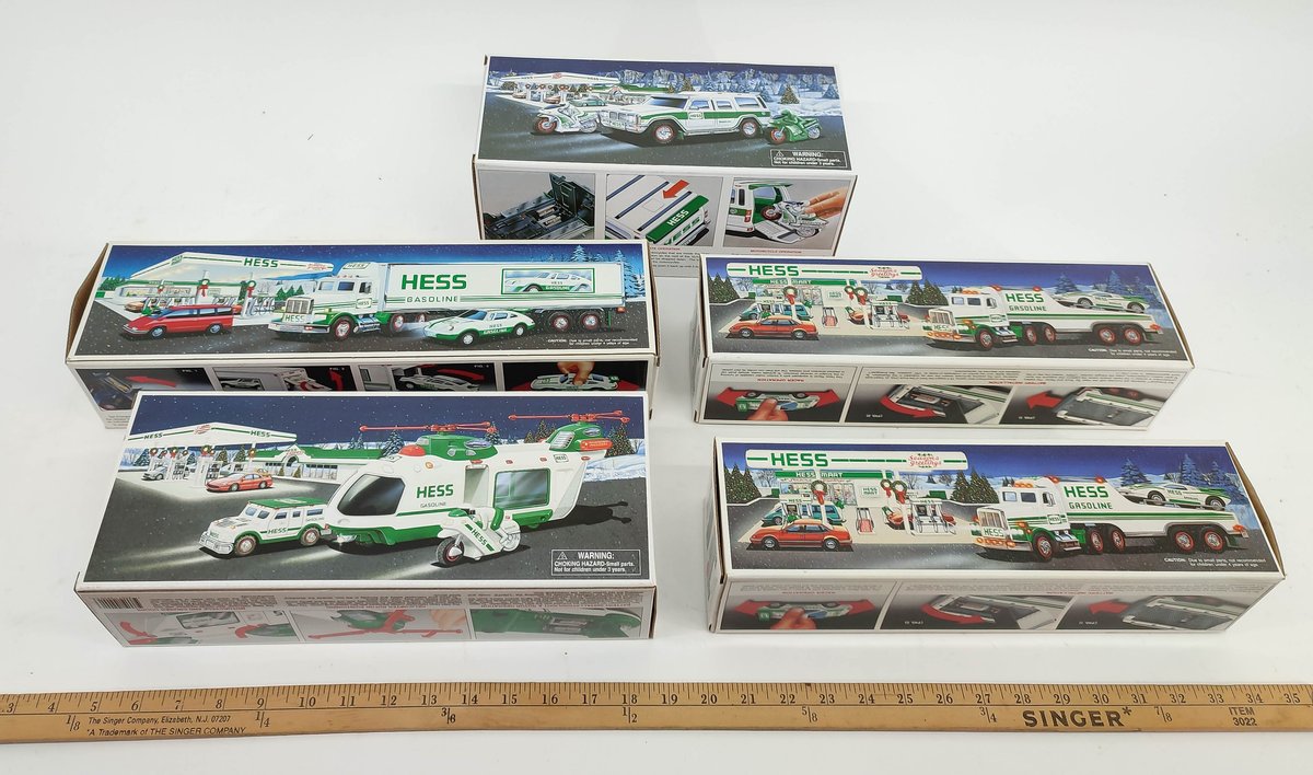5 HESS VEHICLES. HELICOPTER, SUV W/MOTORCYCLES, 18 WHEELER, 2 TK AND RACER. INV 261570687