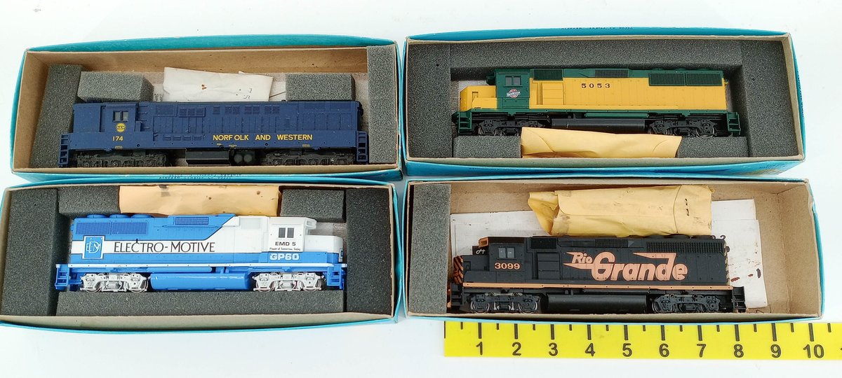4 HO DIESEL LOCOMOTIVES: ELECTRO-MOTIVE GP60, RIO GRANDE 3099, C&NW 5053, N&W 174, 4 BOXES INV 261040029