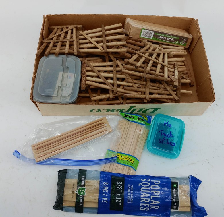 ASSORTED WOODEN FENCE SECTIONS, CEDAR SHIMS, POPLAR SQUARES, WOODSIES STICKS & HO TRACK SPIKES, NNC  INV 263310103