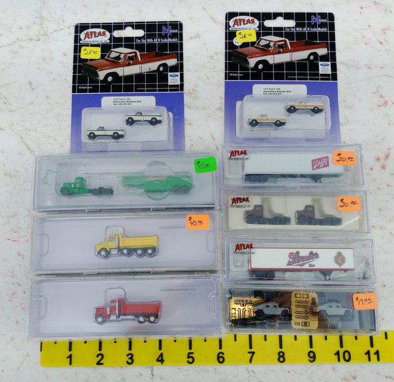 ASSORTED ATLAS N SCALE TRUCKS & TRAILERS, FORD F-100 PICKUPS, DUMP TRUCKS, SOME OBS INV 263330031