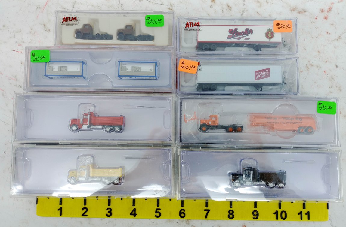 ASSORTED ATLAS N SCALE TRUCKS, STROHS & SCHLITZ TRAILERS, DUMP TRUCKS, TANK CONTAINERS 8 OBS INV 263330054