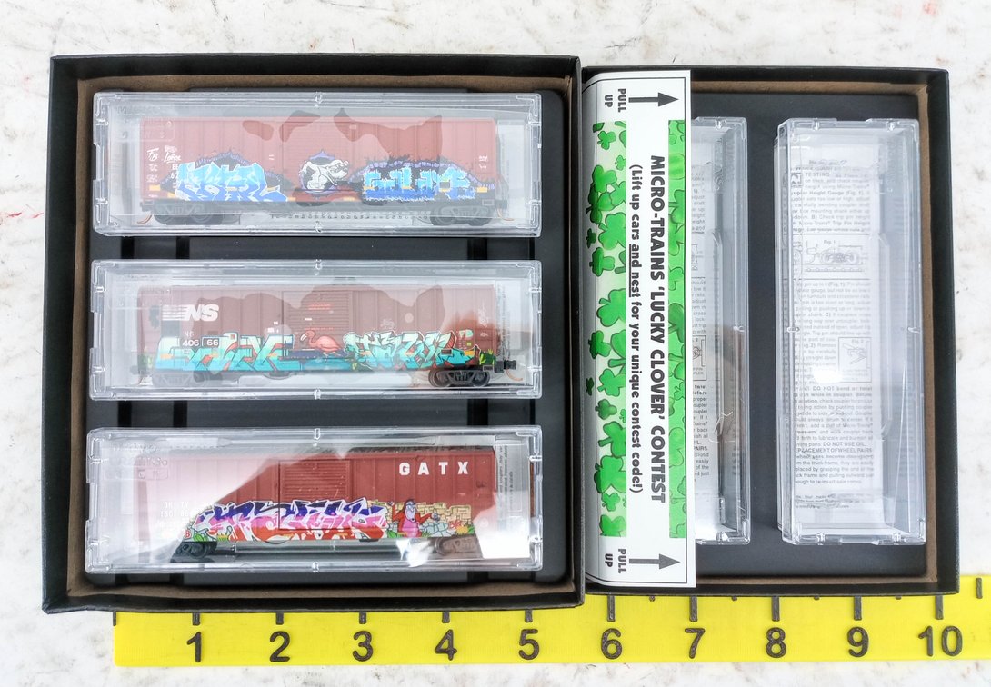 MICRO-TRAINS N SCALE ANIMAL GRAFFITI 3-PACK & EMPTY LUCKY GRAFFITI 2-PACK BOXCARS, 2 OBS INV 263331108