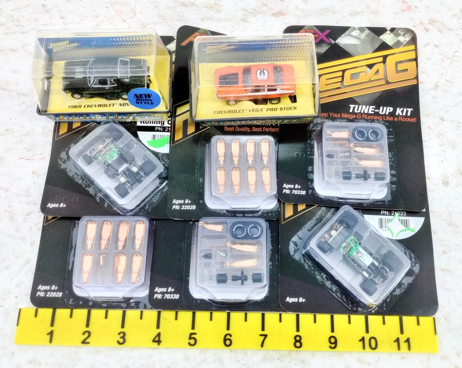 2 JOHNNY LIGHTNING THUNDERJET 500 SLOT CARS NOVA & VEGA WITH 4 AFX MEGA-G TUNE-UP KITS & PARTS 2 OB  INV 263332142