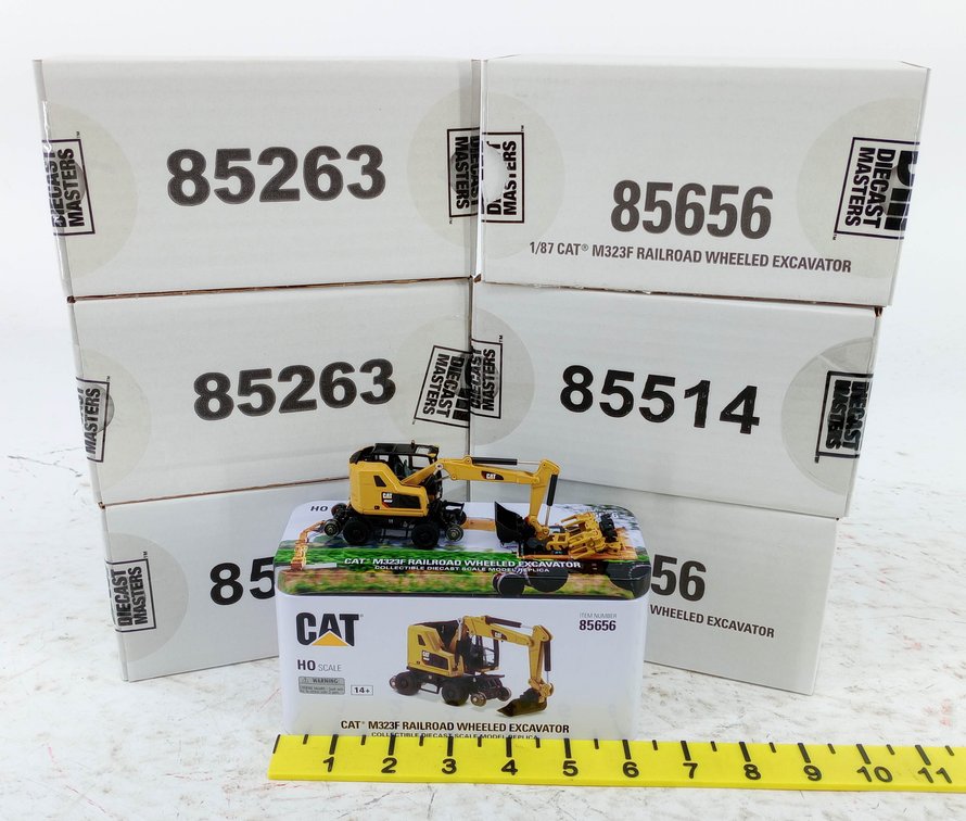 DIECAST MASTERS 1/87 CAT M323F RAILROAD WHEELED EXCAVATOR HO SCALE & 6 SEALED BOXES 6 OB  INV 263332155