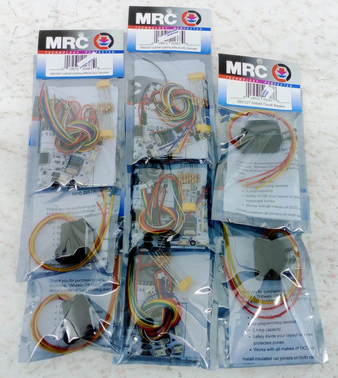 3 MRC 0001667 LIGHTALL DCC DECODERS & 3 MRC 0001527 DISTRICT CIRCUIT BREAKERS, SEALED  INV 263332195