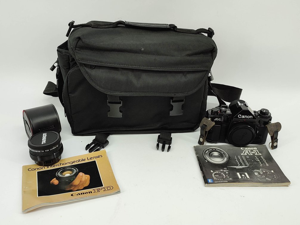 CAMERA CANON A-1 35MM CAMERA & TAMRON FD LENSE W/INSTUCTION BOOK & BLACK BAG  INV 262380534