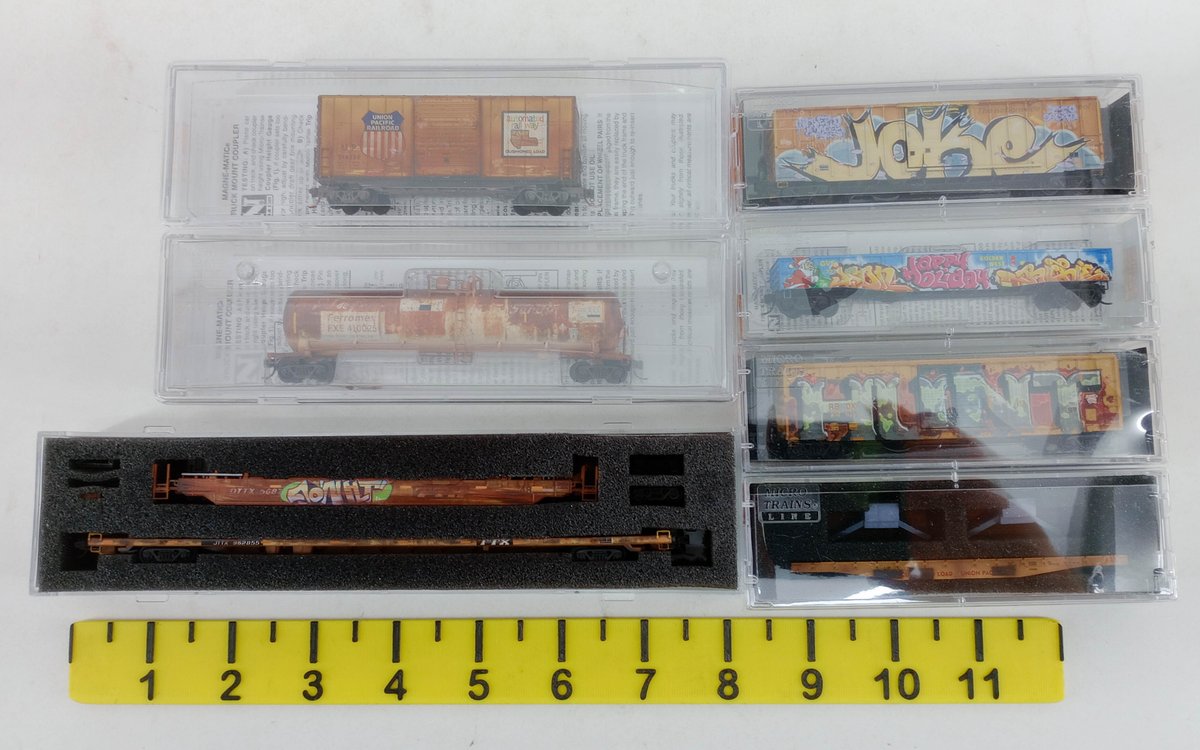 MICRO-TRAINS LINE N SCALE GRAFFITI & WEATHERED FREIGHT CARS, 7 OBS  INV 263331284