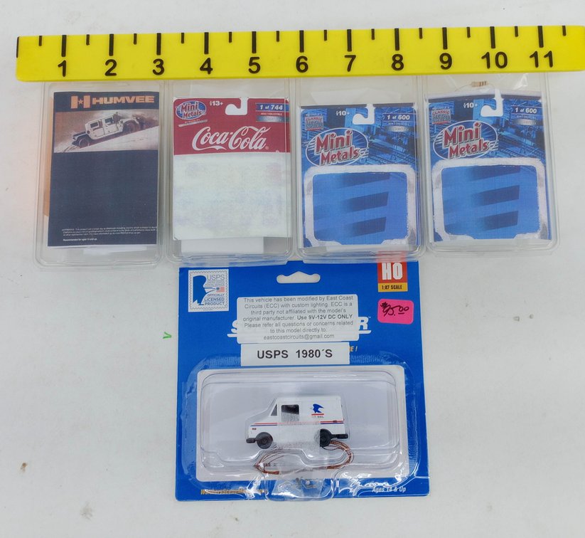 ASSORTED MINI METALS HO & N SCALE VEHICLES INCL USPS MAIL TRUCK, HUMVEE, COCA-COLA, SEALED PACKAGES  INV 263331368