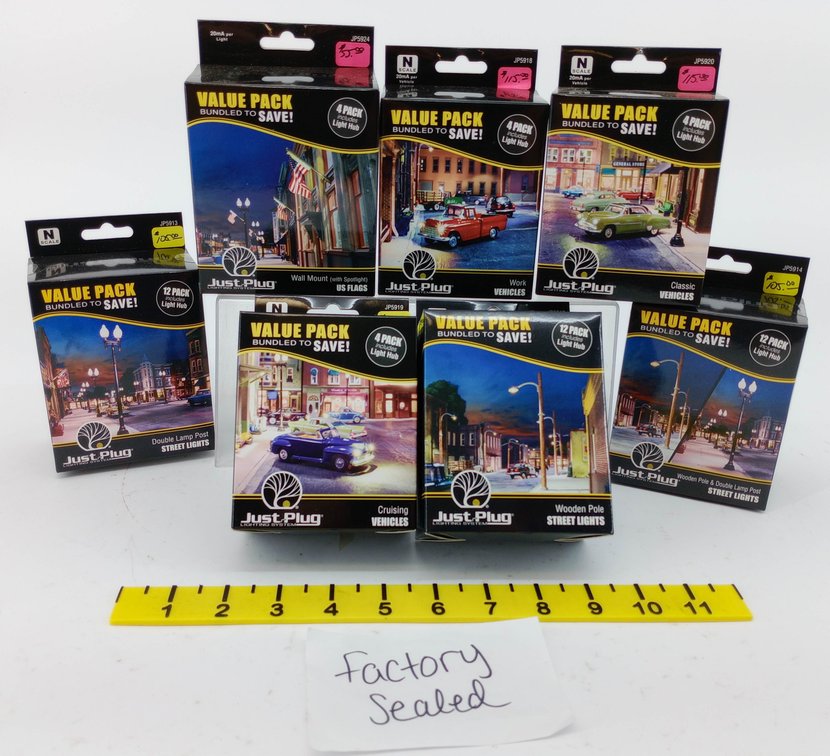 7 WOODLAND SCENICS JUST PLUG N SCALE LIGHTING VALUE PACKS, ASSORTED STREET LIGHTS & VEHICLES, 7 OBS FACTORY SEALED  INV 263331485