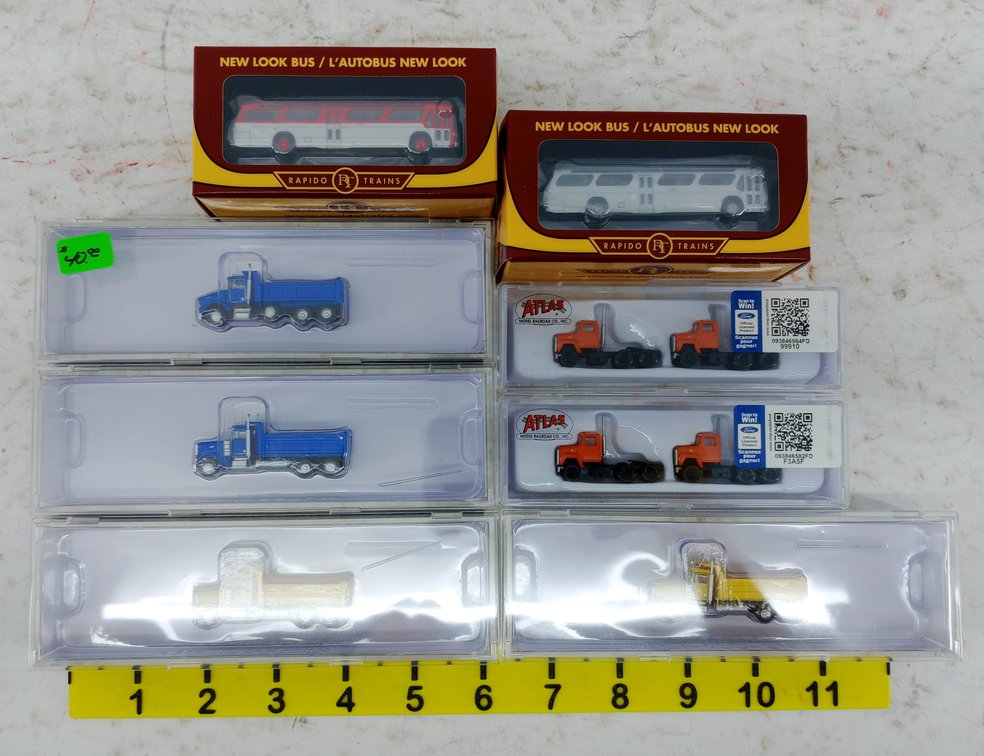 ASSORTED ATLAS & RAPIDO N SCALE TRUCKS & NEW LOOK BUSES, 8 OBS  INV 263331688