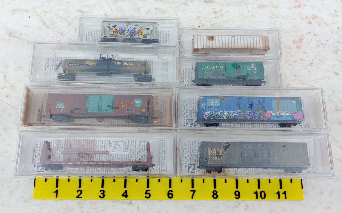 8 MICRO-TRAINS N SCALE WEATHERED GRAFFITI FREIGHT CARS, 8 OBS  INV 263331703