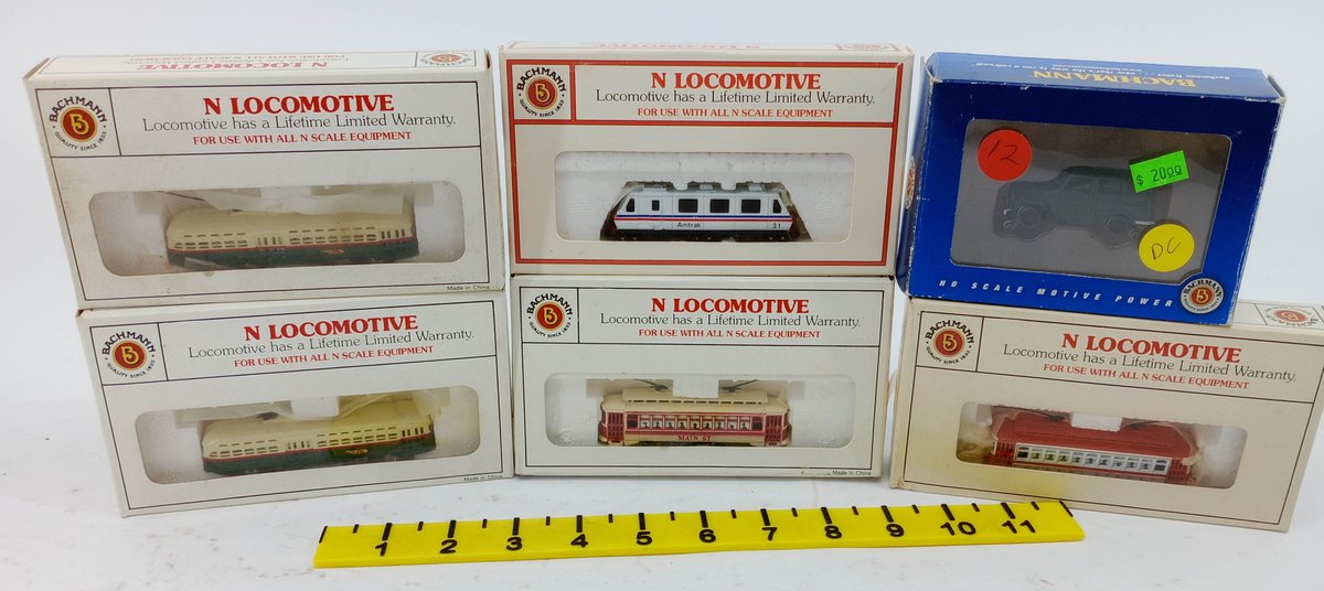 6 BACHMANN N SCALE TROLLEYS & LOCOMOTIVES INCL AMTRAK EM80C, HO MOW VEHICLE, 6 OBS  INV 263331901