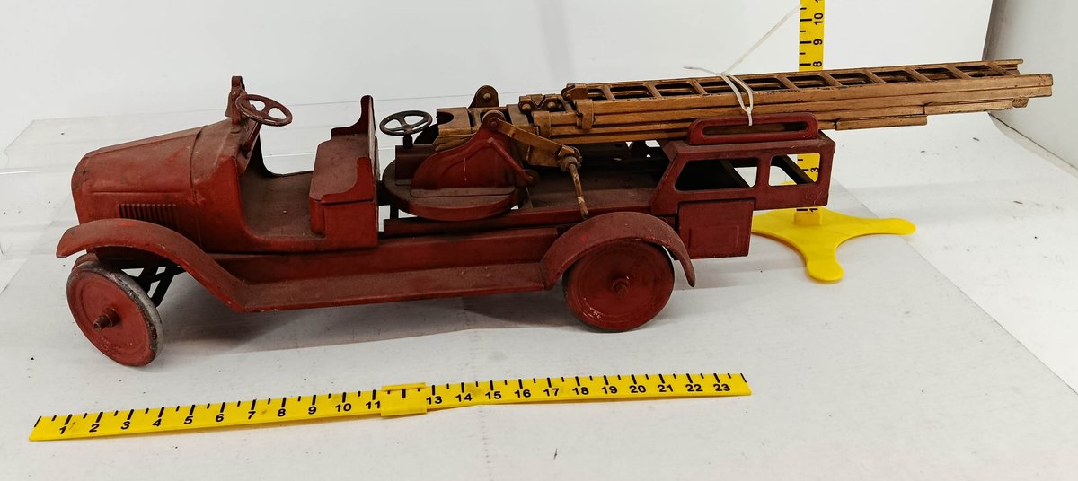 PRESSED STEEL RED FIRE LADDER TRUCK TOY WITH WOOD EXTENSION LADDERS & BRASS BELL 24IN  INV 260740122