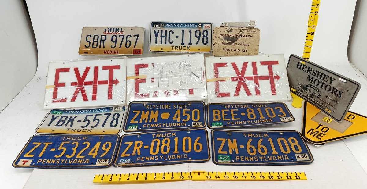 ASSORTED PENNSYLVANIA & OHIO LICENSE PLATES, 3 EXIT SIGN PANELS, HERSHEY MOTORS PLATE & FIRST AID KIT  INV 260901091
