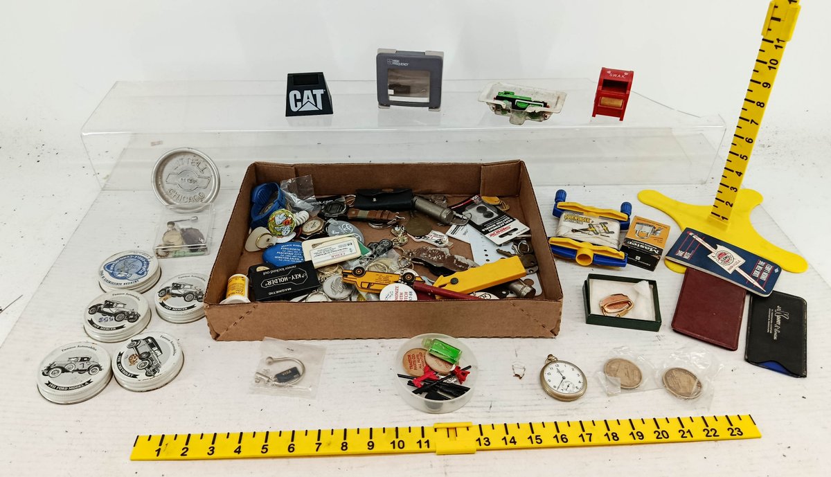 ASSORTED KEYCHAINS, INGERSOLL RELIANCE POCKET WATCH, FAMOUS AUTOMOBILES LIDS, CAT STAND, TOKENS & MORE  INV 260901113