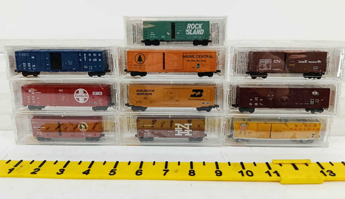 10 MICRO-TRAINS N SCALE ASSORTED 50FT BOXCARS, 10 OBS  INV 262250054