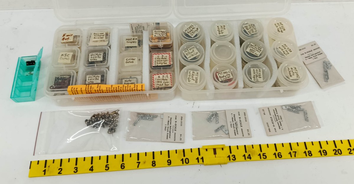 ASSORTED N SCALE COUPLERS, WHEELS, DETAIL PARTS & FINE N-SCALE TRUCK FRAMES  INV 262250100