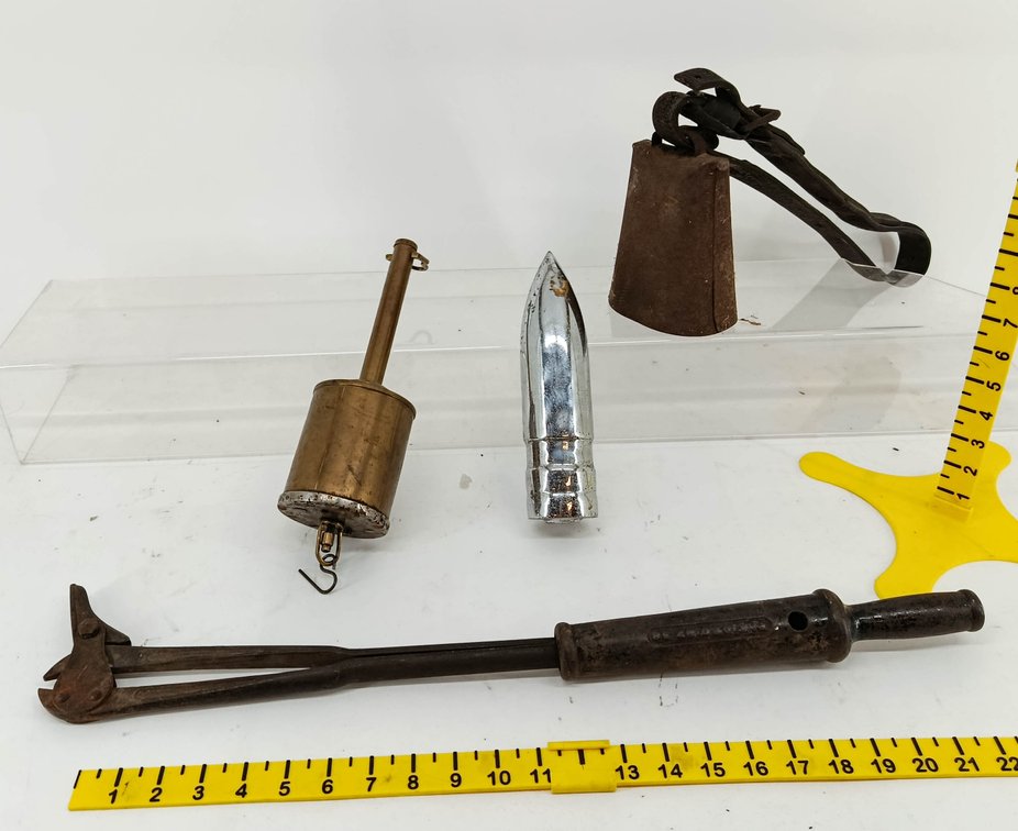 4 TOOLS & ITEMS COWBELL WITH LEATHER STRAP, BRASS WEIGHT, CHROME BULLET FORM & IRON CUTTER  INV 262250140