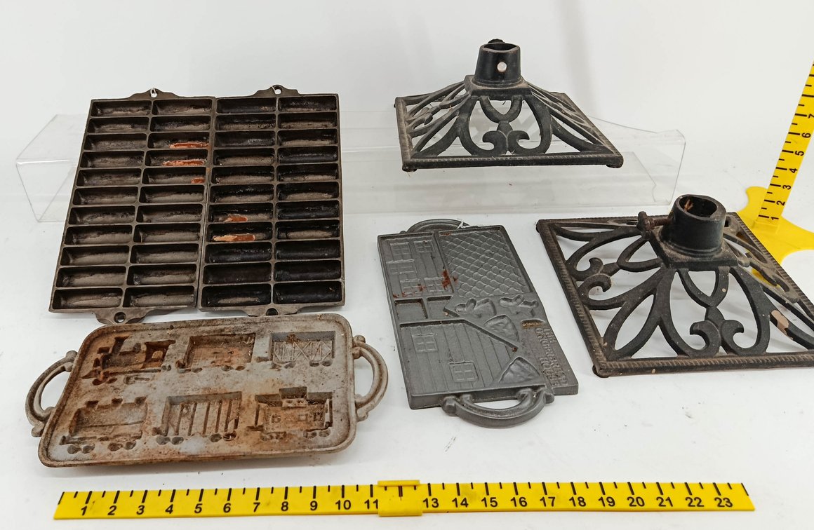 CAST IRON GINGERBREAD HOUSE MOLD, TRAIN MOLD, 2 CORNBREAD STICK PANS & 2 CHRISTMAS TREE STANDS  INV 262250144