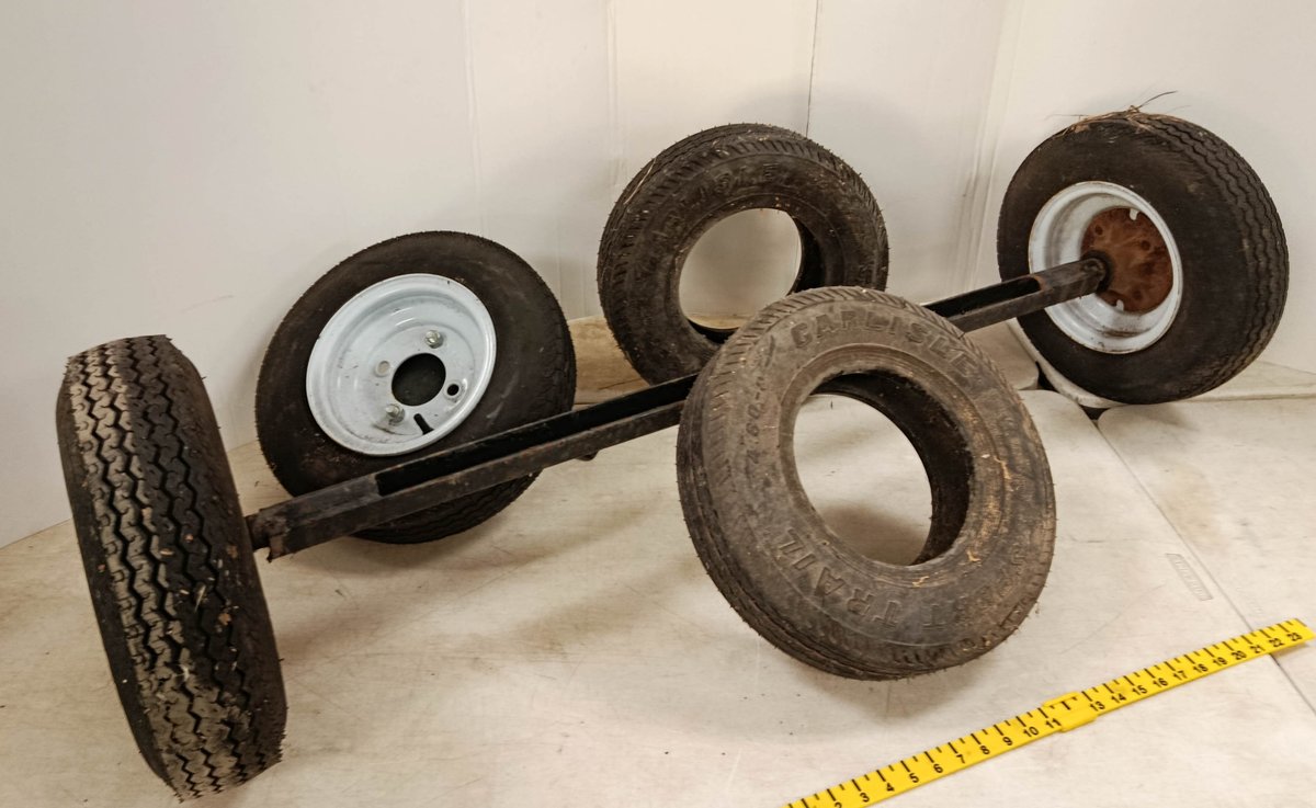 TRAILER AXLE WITH 2 MOUNTED WHEELS & 2 CARLISLE SPORT TRAIL 4.80-8 TIRES  INV 262250155