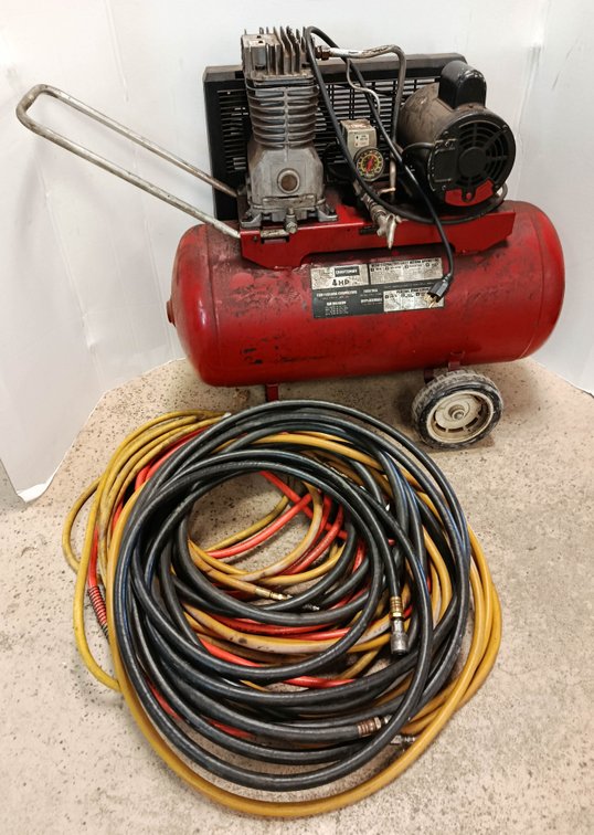 SEARS CRAFTSMAN 4HP 20 GAL TWO CYLINDER AIR COMPRESSOR WITH ASSORTED AIR HOSES  INV 262280263