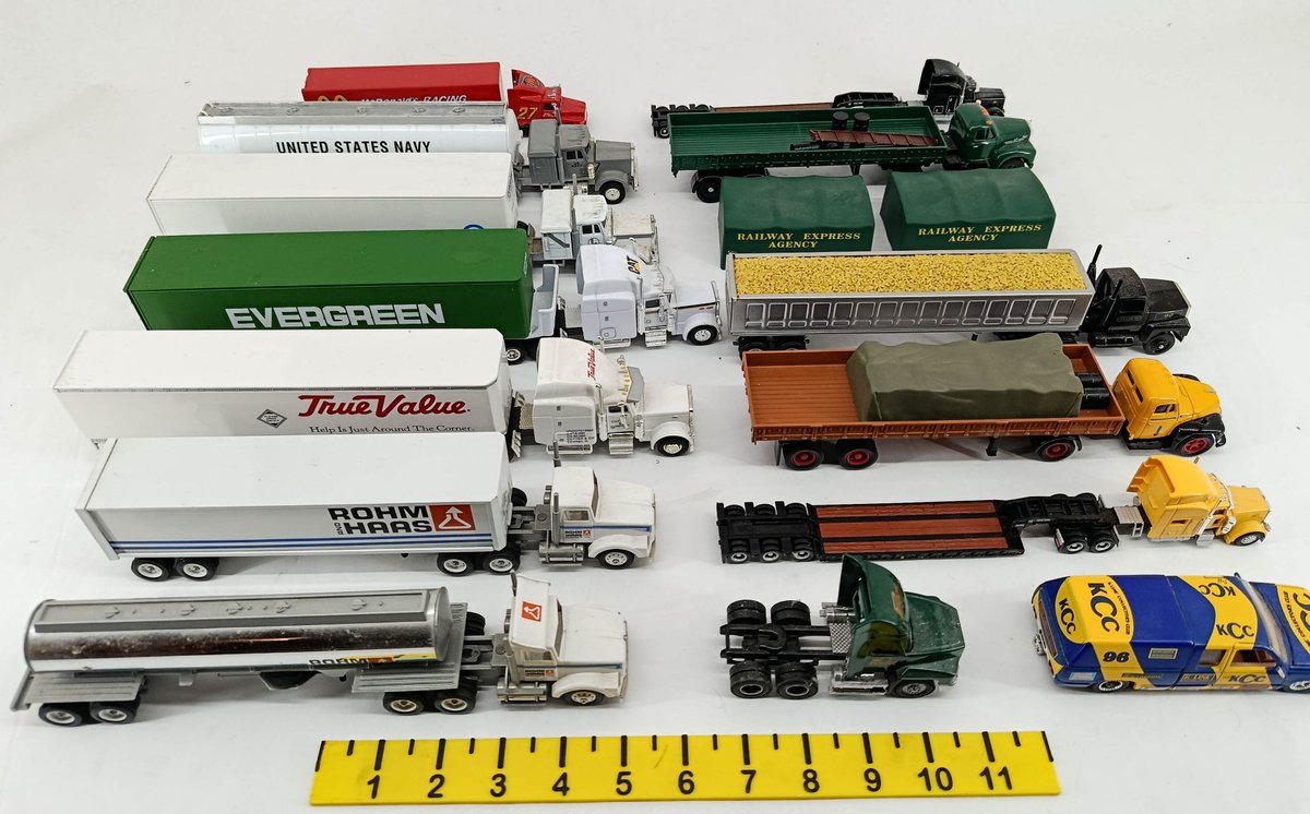 12 ASSORTED DIE-CAST SEMI TRUCKS ROHM AND HAAS TRUE VALUE EVERGREEN US NAVY MCDONALD'S RACING RAILWAY EXPRESS & OTHERS  INV 263400006
