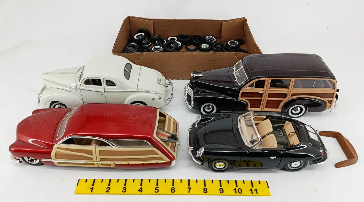 4 DIE-CAST CARS 2 WOODY WAGONS, WHITE COUPE & BLACK PORSCHE CONVERTIBLE WITH BOX OF TIRES & WHEELS  INV 263400008