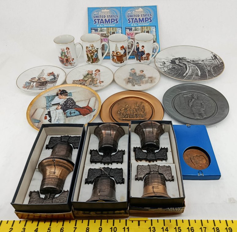 ASSORTED NORMAN ROCKWELL MUGS & PLATES, LIBERTY BELL REPLICAS, US STAMPS, BRONZE & PEWTER PLATES, MEDAL SOME OBS  INV 263400016