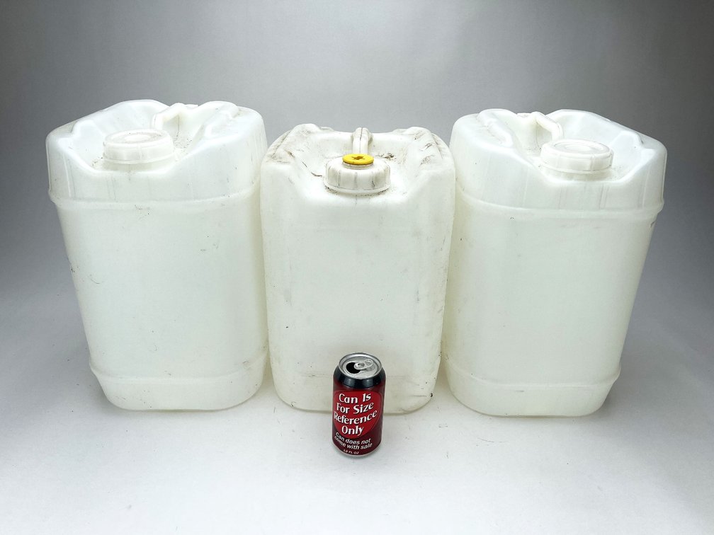Three 5-Gallon Plastic Fuel Cans