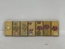 E. German MDI Merit Medals