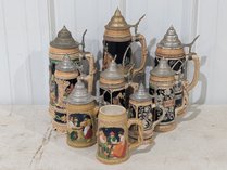 German Ceramic Relief Beer Steins