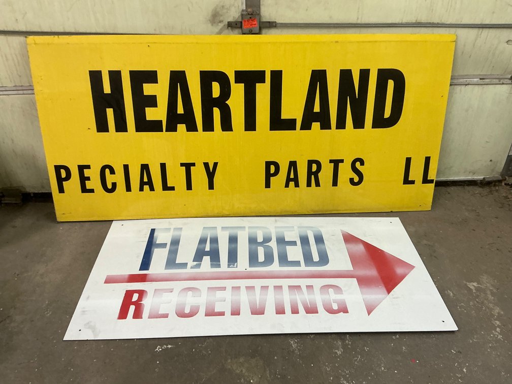 Two Commercial Metal Signs