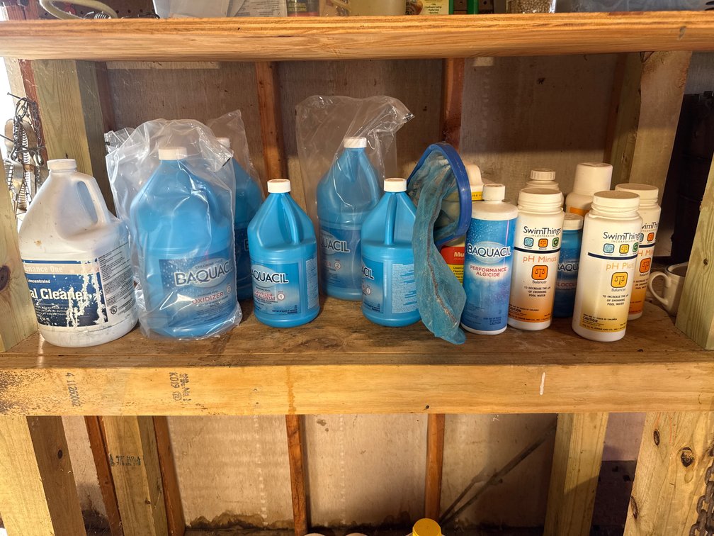 Swimming Pool Chemicals And Skimmer Net