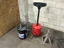 Oil Drain, Bucket Pump, And Jack Stand