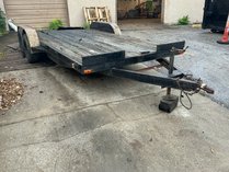 16â Tandem Flatbed Trailer With Ramps