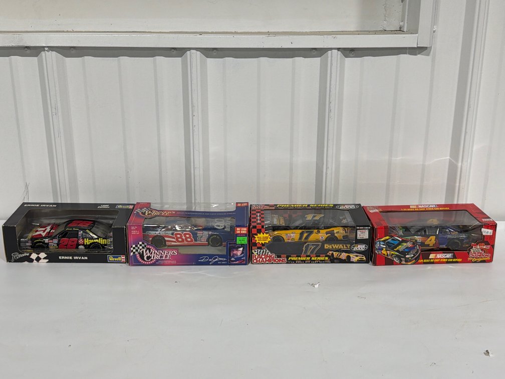 Four NASCAR 1:24 Scale Die-Cast Cars