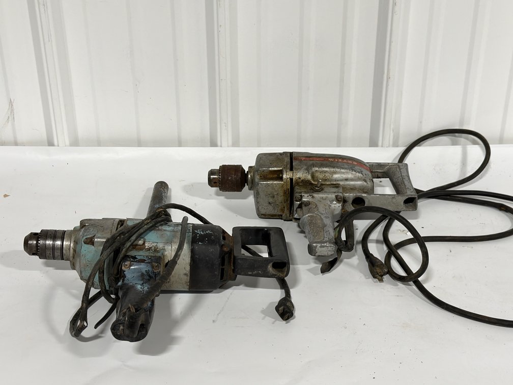 Two Corded Electric Spade Handle Drills