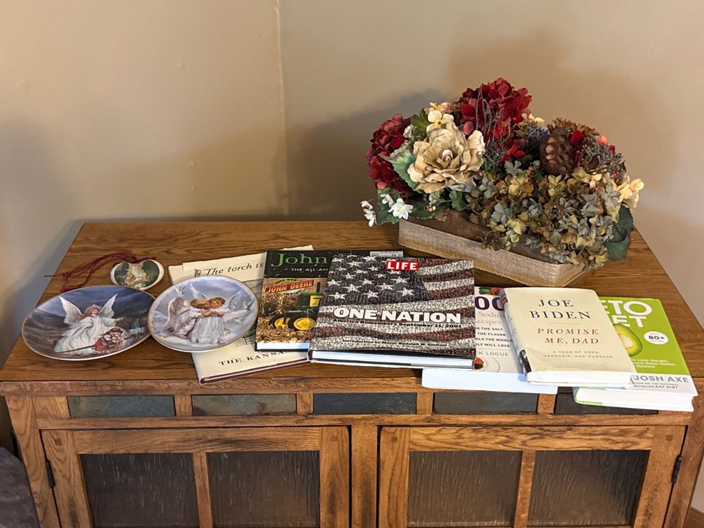 Books Collector Plates And Floral Decor