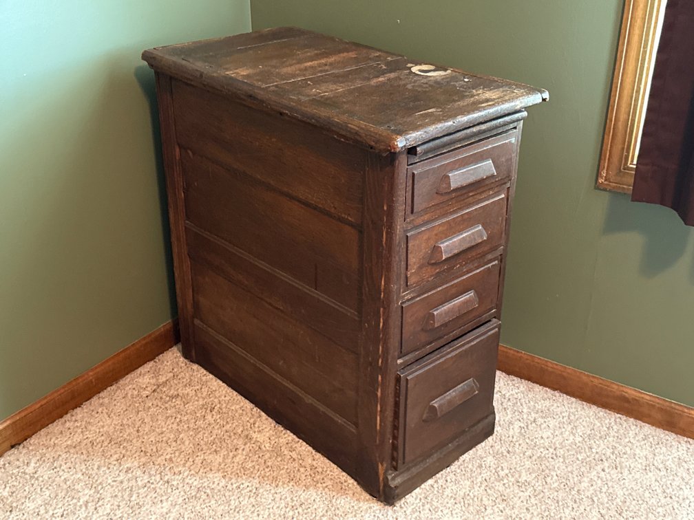 Four-Drawer Wooden Cabinet With Contents