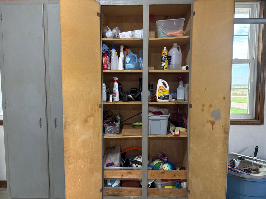 Two-Door Storage Cabinet And Contents