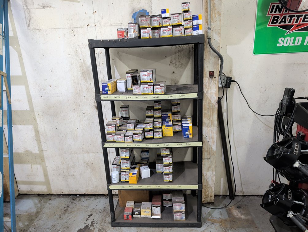 Five-Tier Shelving Unit With Oil Filters