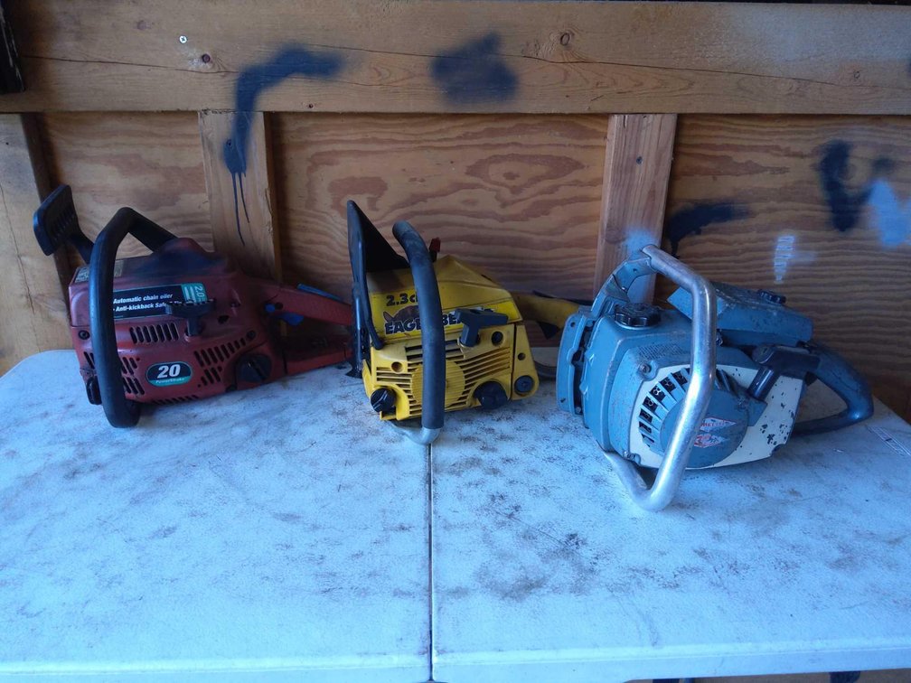 Three Chainsaws