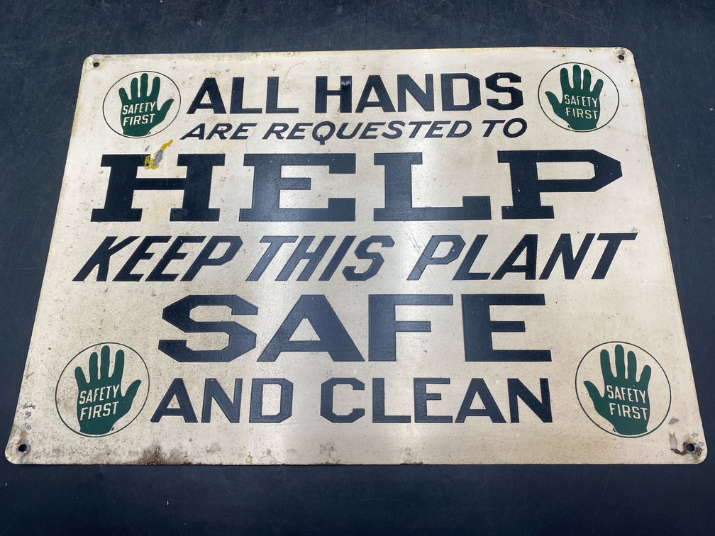 Vintage “Safety First” Metal Sign