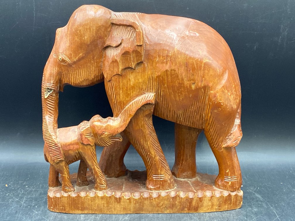 Carved Wooden Elephants Statue